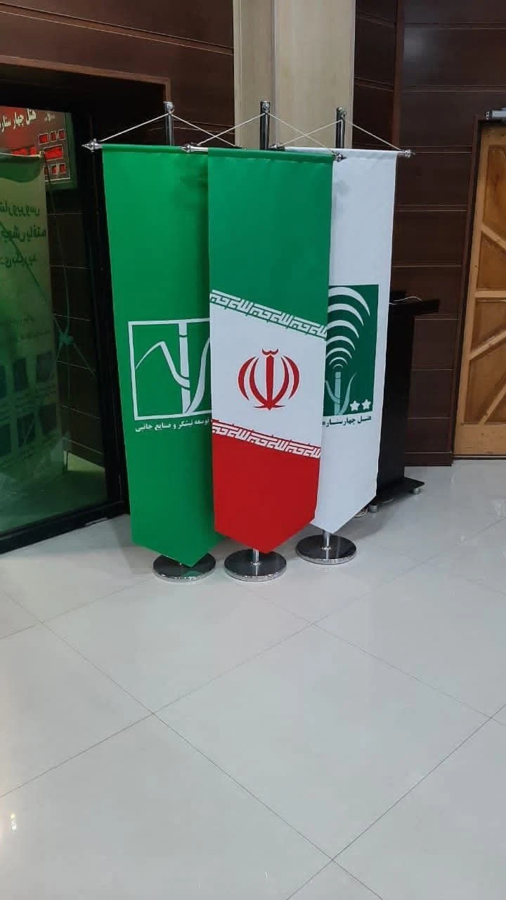 Pointed hanging banners suspended from crossbars on indoor stands